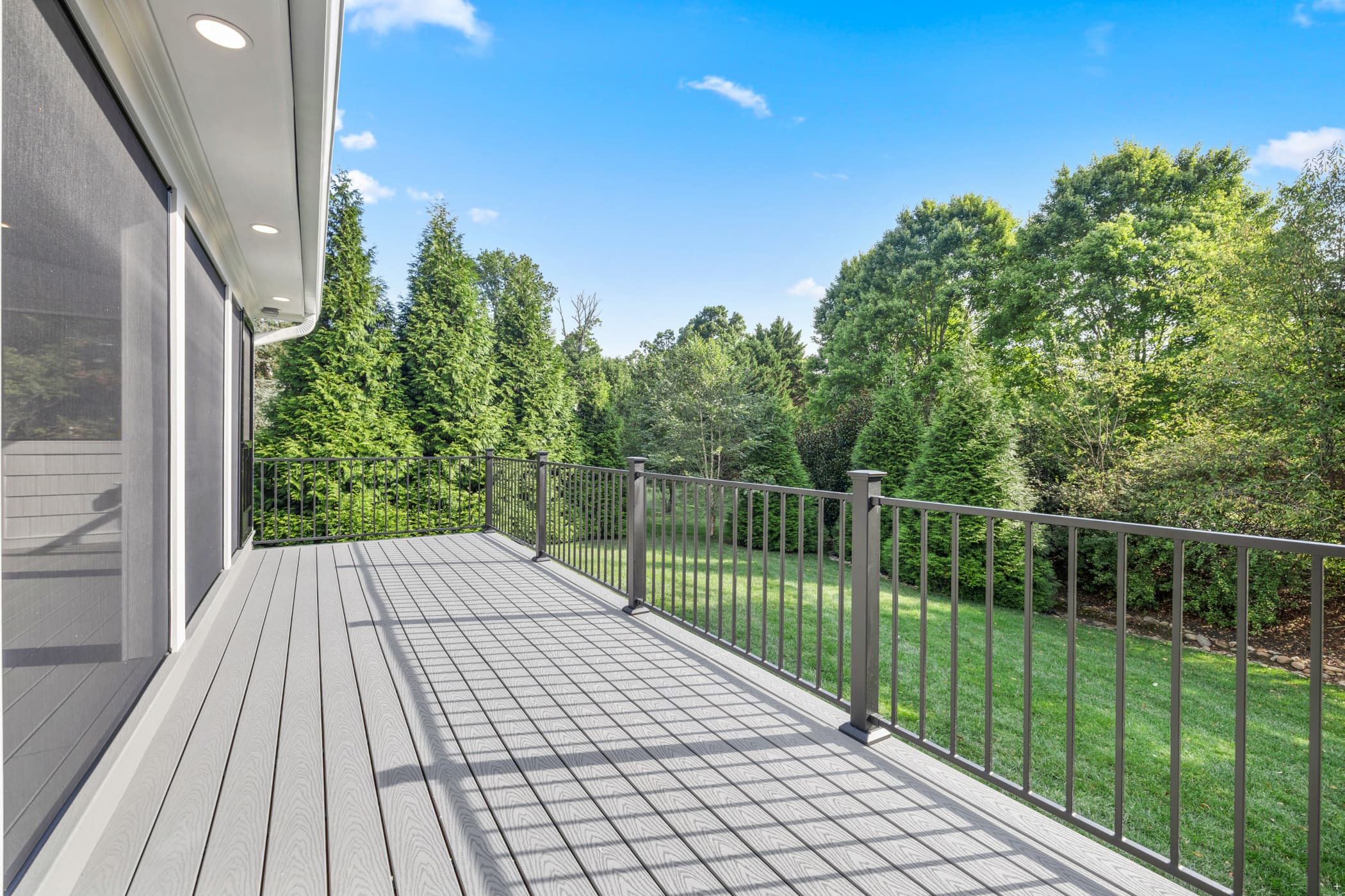 Composite deck with modern railing